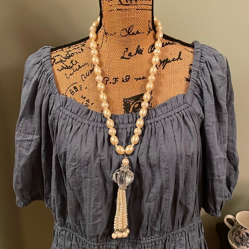Long Cadoro fashion necklace.
